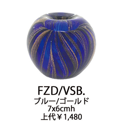 Jarrón de cristal para una sola flor y porta bolígrafos.